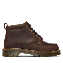 Trzewiki Dr. Martens. Brązowe botki Dr. Martens, bez wzorów, bez obcasa, na płaskiej podeszwie, bez zapięcia. Za 989.99 zł.