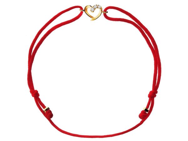 Bransoletka z cyrkoniami i elementami z żółtego złota - serce. Żółte bransoletki Apart, z cyrkonią, złote. Za 429.00 zł.