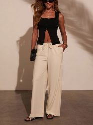 Milan Kiss Top w kolorze czarnym rozmiar: XL. Czarne topy Milan Kiss, xl, bez wzorów, bez kołnierzyka, bez ramiączek. Za 149.31 zł.