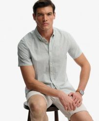 Superdry Klasyczna koszula Seersucker krótki rękaw – 100% bawełna organiczna. Białe koszule Superdry, xl, bez wzorów, z bawełny, klasyczne, bez kołnierzyka, bez ramiączek. Za 282.85 zł.