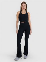 4F Legginsy z rozszerzanymi nogawkami damskie 4F x Anna Lewandowska - czarne L. Czarne legginsy 4f, l, bez wzorów, z dzianiny, z podwyższonym stanem. Za 99.99 zł.