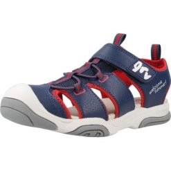 Sandały GARVALIN 242860G Niebieski. Niebieskie sandały Garvalin, bez wzorów, z syntetyku, bez obcasa, bez zapięcia. Za 178.76 zł.