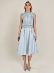 APART Top w kolorze błękitnym rozmiar: 40. Niebieskie topy Apart, bez wzorów, z koronki, bez kołnierzyka, bez ramiączek. Za 239.95 zł.