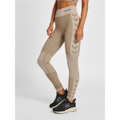 Damskie legginsy mid-rise Hummel Clea. Brązowe legginsy Hummel, bez wzorów. Za 175.50 zł.