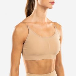 Stanik sportowy Decathlon. Białe koszulki sportowe STAREVER, bez wzorów, z elastanu, bez ramiączek, na jogę i pilates. Za 59.99 zł.