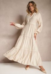 Beżowa Wiskozowa Sukienka o Rozkloszowanym Kroju z Koronką Gonalorin. Brązowe sukienki Renee, na co dzień, l, z aplikacjami, z koronki, eleganckie, bez kołnierzyka, bez ramiączek, maxi, rozkloszowane. Za 129.99 zł.