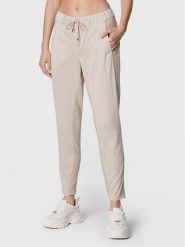 Marc Aurel Spodnie materiałowe 1615 2300 93133 Beżowy Loose Fit. Brązowe spodnie materiałowe Marc Aurel, bez wzorów, z bawełny. Za 659.99 zł.
