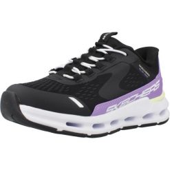 Kapcie SKECHERS SLIP-INS GLIDESTEP VISTA LANE Czarny. Czarne obuwie domowe Skechers, bez wzorów, z syntetyku, bez zapięcia. Za 285.99 zł.