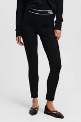 KARL LAGERFELD Czarne damskie legginsy. Czarne legginsy KARL LAGERFELD, xs, bez wzorów, z materiału. W wyprzedaży za 359.99 zł.