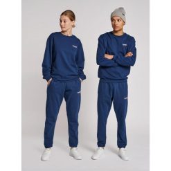 Jogging Hummel GC Austin. Niebieskie spodnie sportowe Hummel, m, bez wzorów, z tkaniny, do biegania. Za 234.00 zł.