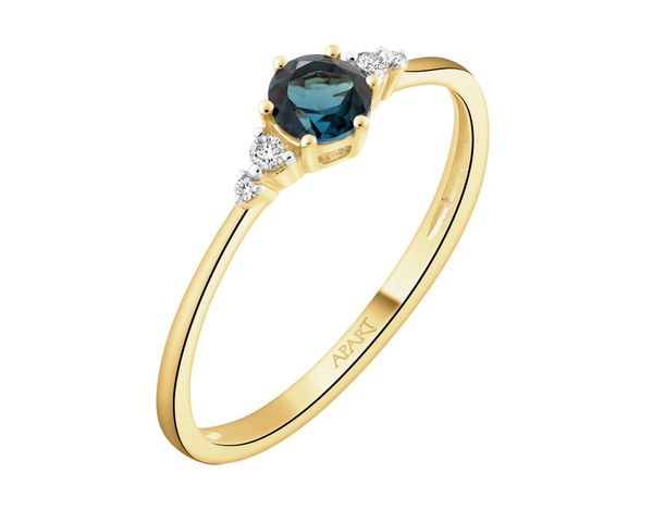 Pierścionek z żółtego złota z brylantami i topazem London Blue - próba 585. Niebieskie pierścionki Apart, z brylantem, złote. Za 1,629.00 zł.