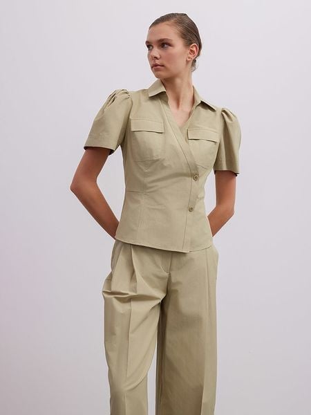 BGN Bluzka w kolorze jasnozielonym rozmiar: 34. Zielone bluzki BGN, bez wzorów, bez kołnierzyka, bez ramiączek. Za 78.10 zł.