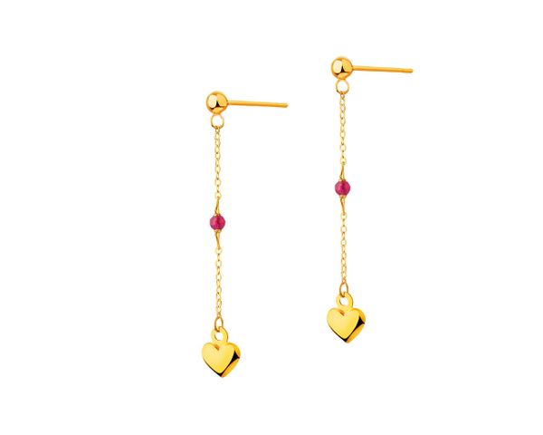 Złote kolczyki z cyrkoniami - serca. Żółte kolczyki Apart, z cyrkonią, złote. W wyprzedaży za 279.30 zł.