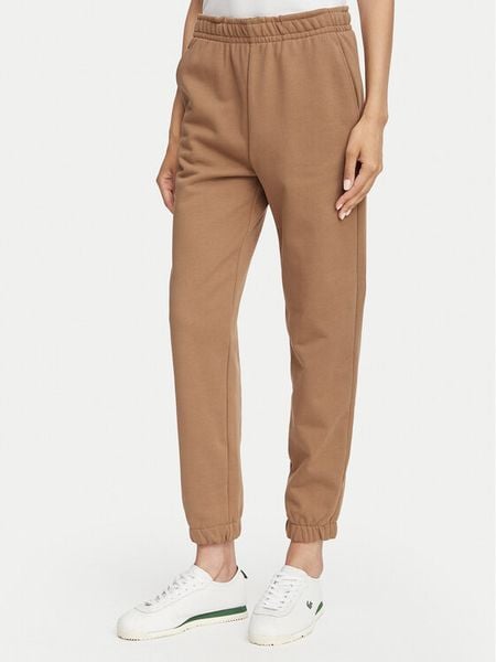 Lacoste Spodnie dresowe XF5268 Beżowy Regular Fit. Brązowe spodnie dresowe Lacoste, bez wzorów, z bawełny. Za 521.99 zł.