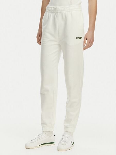 Lacoste Spodnie dresowe XF7604 Biały Regular Fit. Białe spodnie dresowe Lacoste, bez wzorów, z bawełny. Za 363.99 zł.