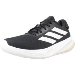 Kapcie ADIDAS SUPERNOVA EASE W Czarny. Czarne obuwie domowe Adidas, bez wzorów, z syntetyku, bez zapięcia. Za 380.95 zł.
