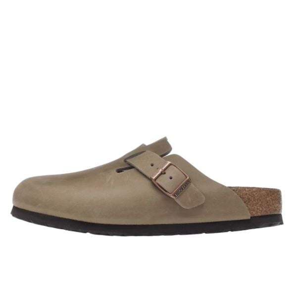 Klapki damskie Birkenstock Boston. Brązowe klapki Birkenstock, bez wzorów, z materiału, bez obcasa. Za 873.00 zł.