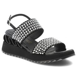 Sandały damskie S.Barski, cholewka ze skóry naturalnej na masywnej podeszwie z ozdobnymi nitami na szerokich paskach łączą rockowy charakter z komfor. Czarne sandały S.BARSKI, bez wzorów, ze skóry, rockowe, bez obcasa, na koturnie, bez zapięcia. Za 309.00 zł.