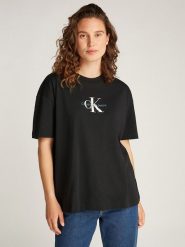 CALVIN KLEIN JEANS Koszulka w kolorze czarnym rozmiar: XS. Czarne bluzki Calvin Klein Jeans, xs, bez wzorów, z bawełny, bez kołnierzyka, bez ramiączek. Za 97.28 zł.