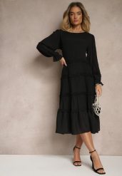 Czarna Bawełniana Sukienka z Ozdobnymi Falbankami Eranisa. Czarne sukienki Renee, s, bez wzorów, z bawełny, eleganckie, bez kołnierzyka, bez ramiączek, midi. Za 69.99 zł.