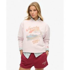 Luźny sweter z motywem pamiątkowym. Czerwone koszulki sportowe Superdry, bez wzorów, bez ramiączek. W wyprzedaży za 244.50 zł.