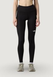 Legginsy Kobieta THE NORTH FACE W FLEX 28IN TIGHT. Czarne legginsy sportowe The North Face, l, bez wzorów, z elastanu, z podwyższonym stanem, na fitness i siłownię. Za 282.25 zł.