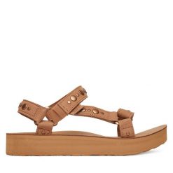 Sandały Teva. Brązowe sandały Teva, bez wzorów, bez obcasa, na płaskiej podeszwie, bez zapięcia. Za 449.99 zł.