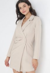 Jasnobeżowa Sukienka Ionitheme. Brązowe sukienki Born2be, l, bez wzorów, eleganckie, bez kołnierzyka, bez ramiączek, mini, kopertowe. Za 99.99 zł.