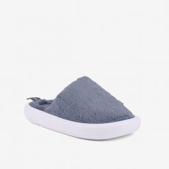Damskie kapcie zimowe Coqui Homies. Niebieskie obuwie domowe Coqui, bez wzorów, z materiału, bez zapięcia. Za 134.99 zł.