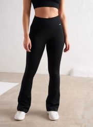 Damskie legginsy bezszwowe prążkowane rozszerzane wysoki stan squat proof czarne. Czarne legginsy AIM'N, s, bez wzorów, z dzianiny, z podwyższonym stanem. Za 297.00 zł.