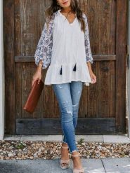 Milan Kiss Bluzka w kolorze kremowo-granatowym rozmiar: M. Brązowe bluzki Milan Kiss, m, bez wzorów, z wiskozy, bez kołnierzyka, bez ramiączek. Za 86.99 zł.