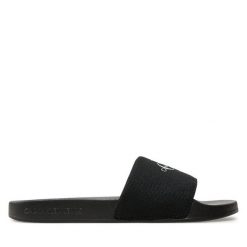 Klapki Calvin Klein Jeans. Czarne klapki Calvin Klein Jeans, bez wzorów, z jeansu, bez obcasa. Za 109.99 zł.