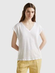 Benetton Lniana koszulka w kolorze białym rozmiar: M. Białe bluzki Benetton, m, bez wzorów, ze lnu, bez kołnierzyka, bez ramiączek. Za 79.59 zł.