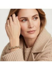 Otazu Pozłacana bransoletka z kryształami Swarovski rozmiar: onesize. Czarne bransoletki Otazu, z kryształem, pozłacane. Za 104.99 zł.