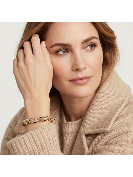 Otazu Pozłacana bransoletka z kryształami Swarovski rozmiar: onesize. Czarne bransoletki Otazu, z kryształem, pozłacane. Za 104.99 zł.