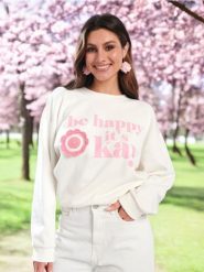 Bluza z nadrukiem - kremowy. Białe bluzy Sinsay, l, bez wzorów, z bawełny, bez kaptura. Za 49.99 zł.