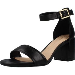 Sandały CLARKS EZORIA MAE Czarny. Czarne sandały Clarks, bez wzorów, z materiału, bez obcasa, bez zapięcia. Za 219.99 zł.