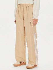 Adidas Spodnie dresowe adicolor 3-Stripes IZ0717 Beżowy Loose Fit. Brązowe spodnie dresowe Adidas, xl, bez wzorów, z dresówki. Za 229.99 zł.