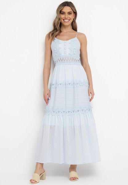 Jasnoniebieska Bawełniana Sukienka Maxi z Rozkloszowanym Dołem i Ażurową Talią Fidelma. Niebieskie sukienki Born2be, s, w ażurowe wzory, z bawełny, wakacyjne, bez kołnierzyka, bez ramiączek, maxi, rozkloszowane. Za 99.99 zł.