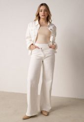 Białe Szerokie Jeansy z Bawełny z Asymetrycznym Zapięciem Saphisia. Białe jeansy Born2be, l, bez wzorów. Za 139.99 zł.