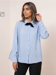 Wiskozowa koszula z wiązaniem - błękitny. Niebieskie koszule Sinsay, l, bez wzorów, z wiskozy, bez kołnierzyka, bez ramiączek. Za 39.99 zł.