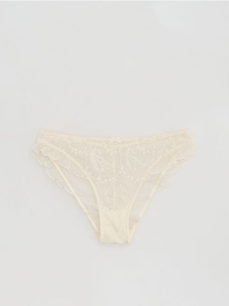 Majtki figi z haftem - złamana biel. Figi Reserved, l, bez wzorów. W wyprzedaży za 35.99 zł.