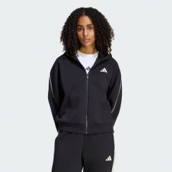 BLUZA STADIUM Z KAPTUREM, MAŁYM LOGO I SUWAKIEM NA CAŁEJ DŁUGOŚCI. Czarne bluzy Adidas, m, bez wzorów, z bawełny, z kapturem. Za 329.00 zł.