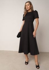 Czarna Elegancka Sukienka VICES o Rozkloszowanym Kroju z Krótkim Rękawem Aezith. Czarne sukienki Born2be, na co dzień, l, bez wzorów, eleganckie, bez kołnierzyka, bez ramiączek, maxi, proste. Za 219.99 zł.