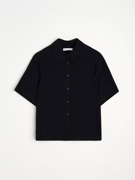 Koszula z wiskozą - czarny. Czarne koszule Sinsay, l, bez wzorów, z wiskozy, bez kołnierzyka, bez ramiączek. Za 39.99 zł.