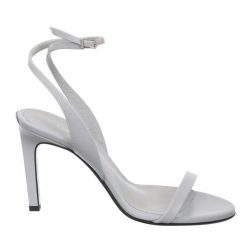 Sandały Calvin Klein w kolorze perłowo-niebieskim. Niebieskie sandały Calvin Klein, bez wzorów, z materiału, eleganckie, bez obcasa, bez zapięcia. Za 489.99 zł.