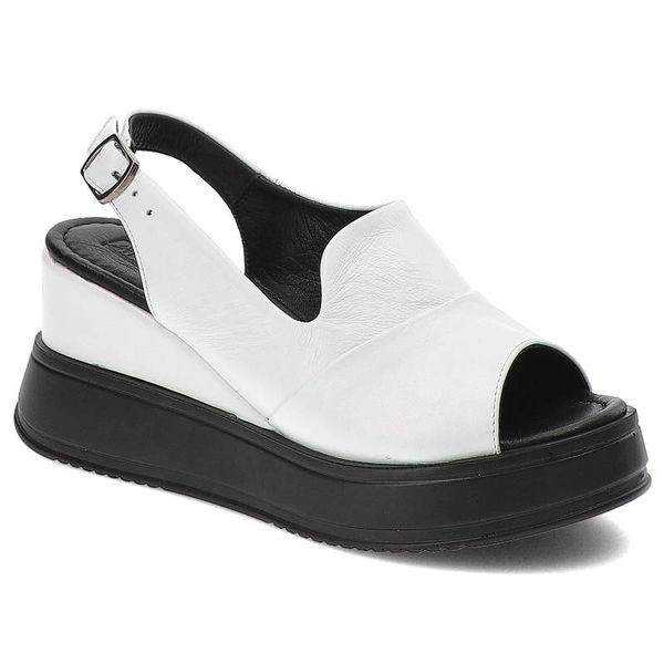 Białe Sandały Artiker Skórzane Buty Damskie. Białe sandały Artiker, bez wzorów, ze skóry, eleganckie, bez obcasa, na koturnie, bez zapięcia. Za 279.00 zł.