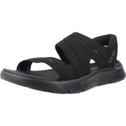 Sandały Skechers Model Slip-ins Go Walk Flex Kolor Czarny. Czarne sandały Skechers, bez wzorów, bez obcasa, bez zapięcia. Za 279.99 zł.