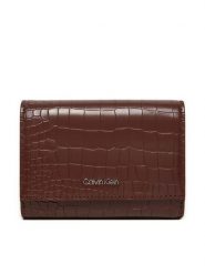 Calvin Klein Portfel Ck Must Md Trifold K60K612453 Brązowy. Brązowe portfele Calvin Klein, bez wzorów, ze skóry. Za 259.99 zł.