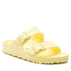 Klapki Birkenstock. Żółte klapki Birkenstock, bez wzorów, bez obcasa. Za 249.99 zł.